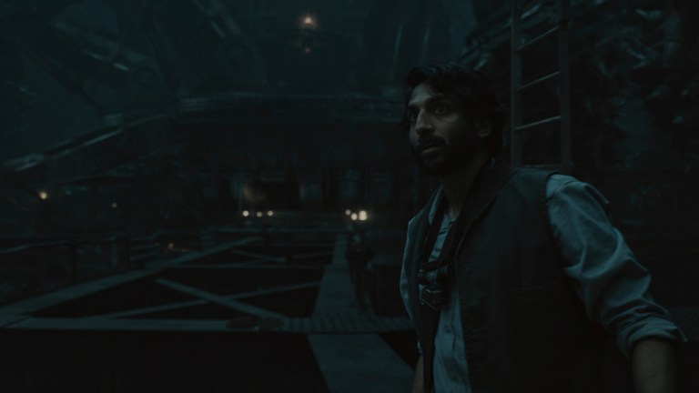 Lukas Kyle (Avi Nash) in the bowels of mechanical in Apple TV+'s Silo.